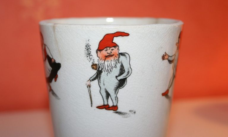 A scandinavian vintage gnome "tomte" drawing on porcelain from Gefle porslinsfabrik